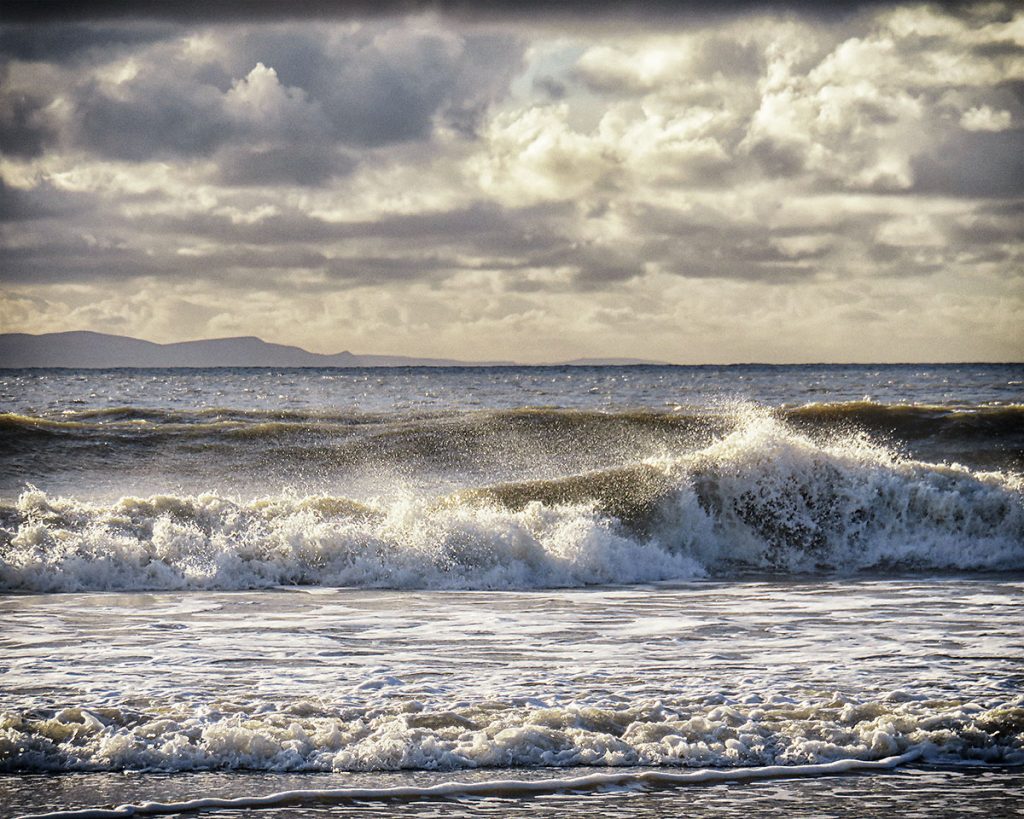 Waves breaking on Llantwit Major Beach.